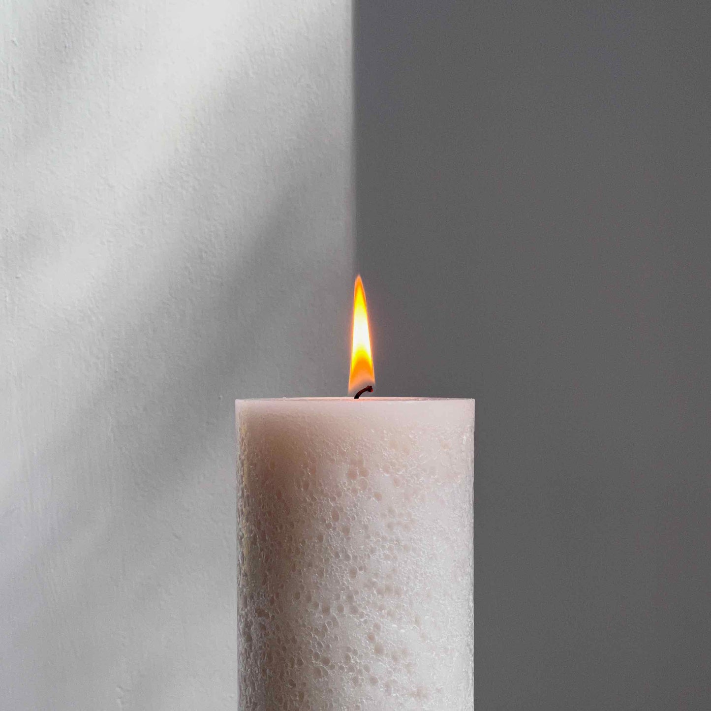 Textured pillar candle in ivory