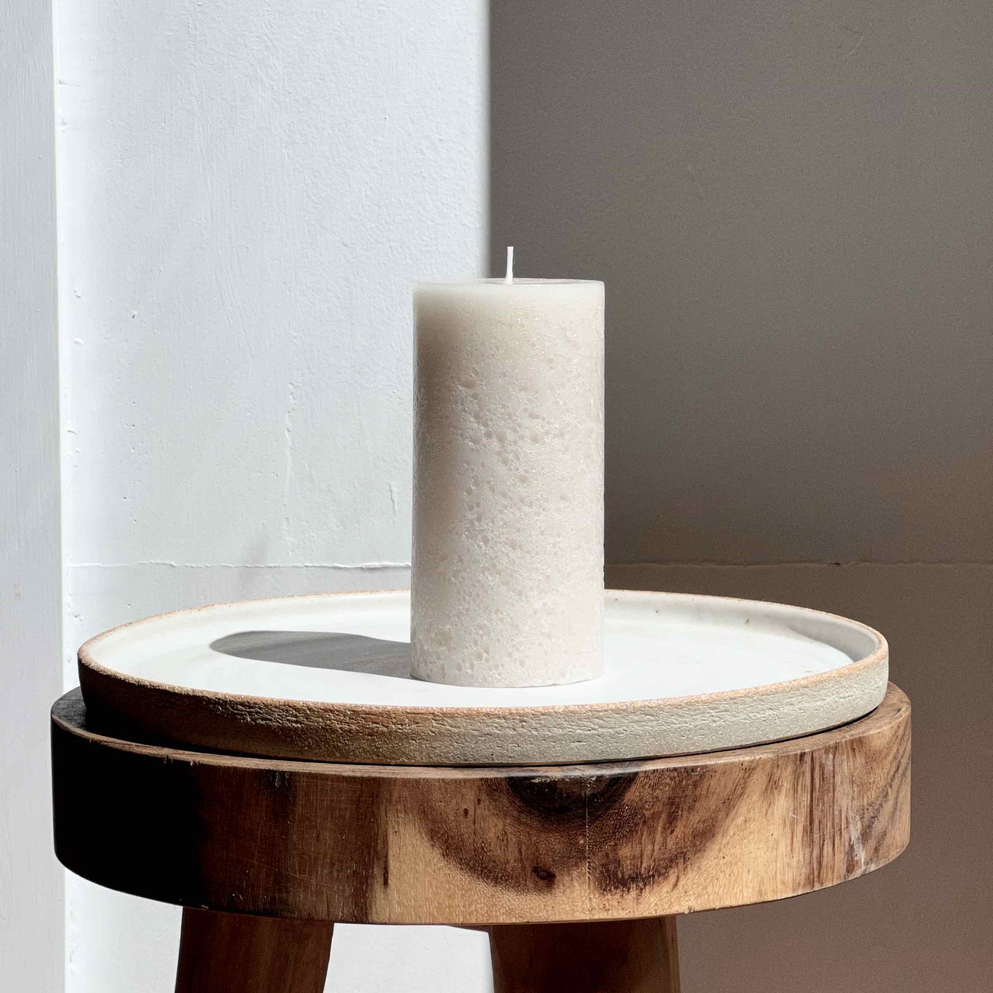 Textured stone pillar candle