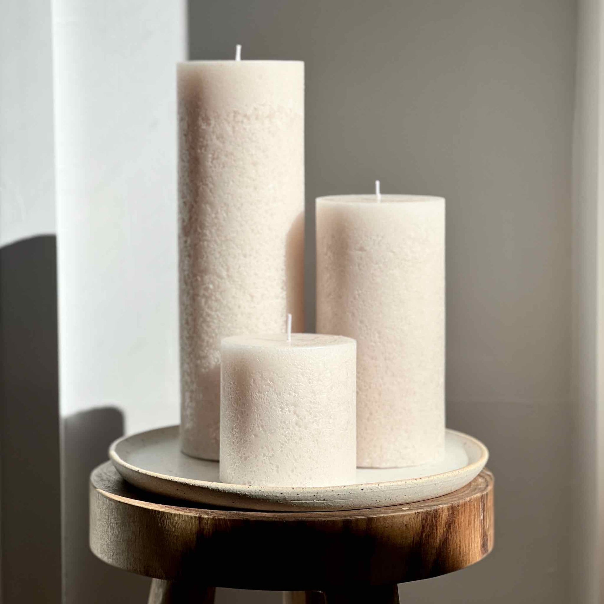 Ivory coloured textured pillar candles