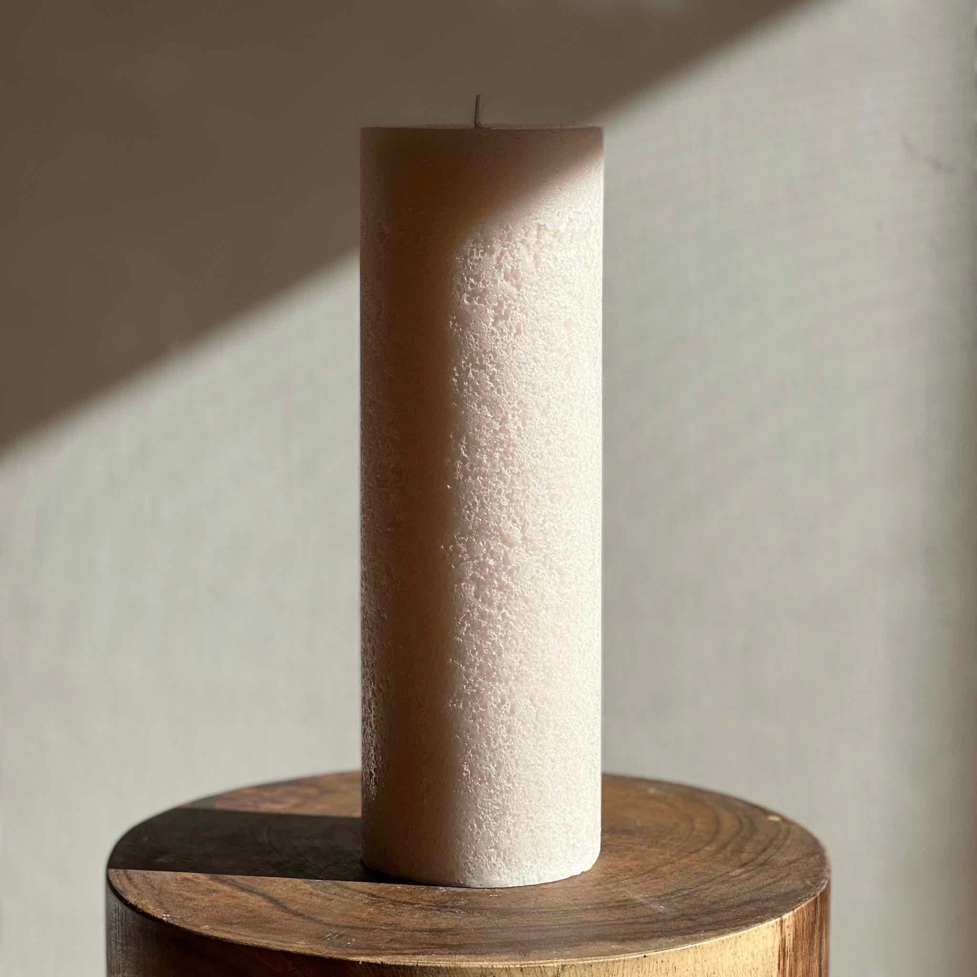 Large textured pillar candle in ivory