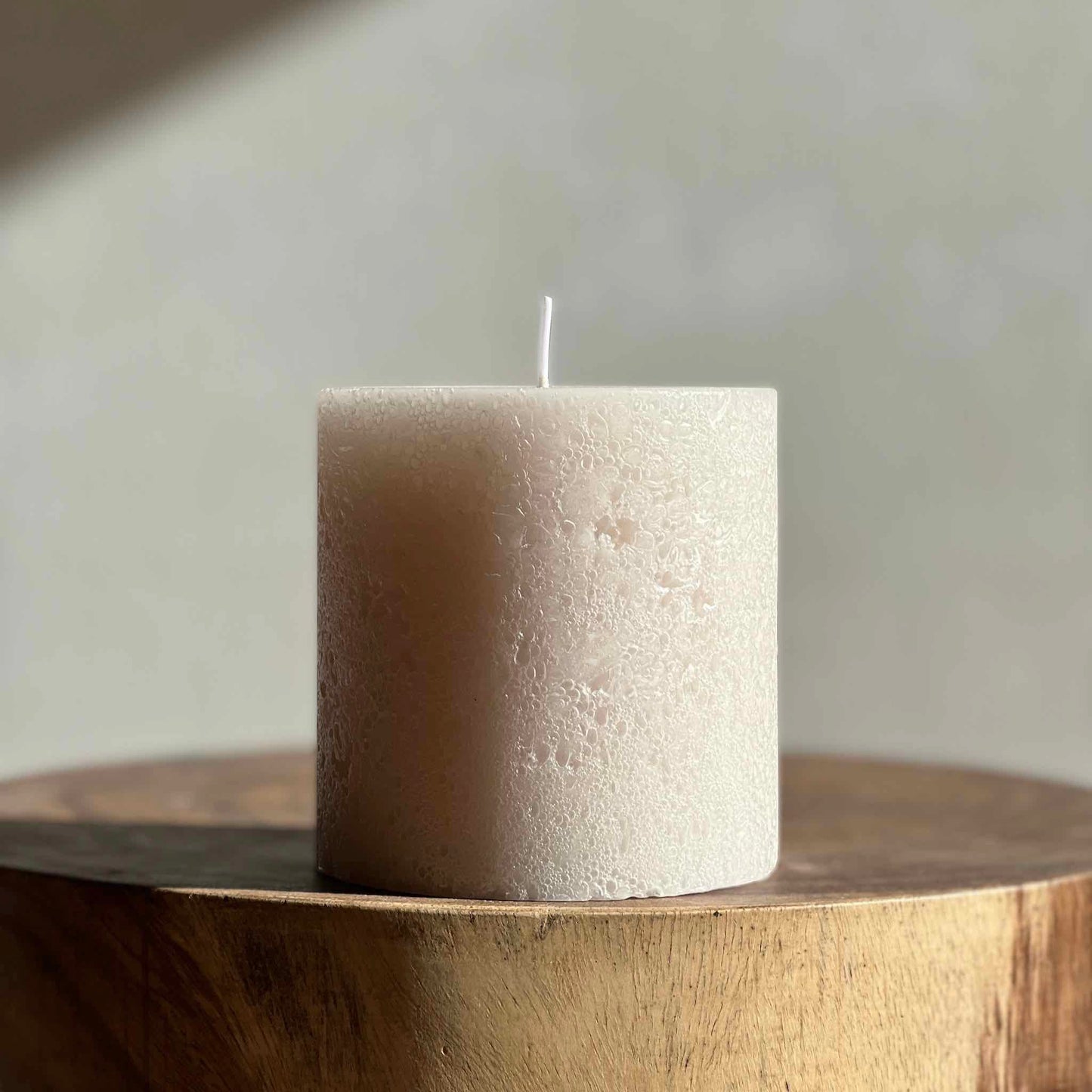 Stone coloured textured candle
