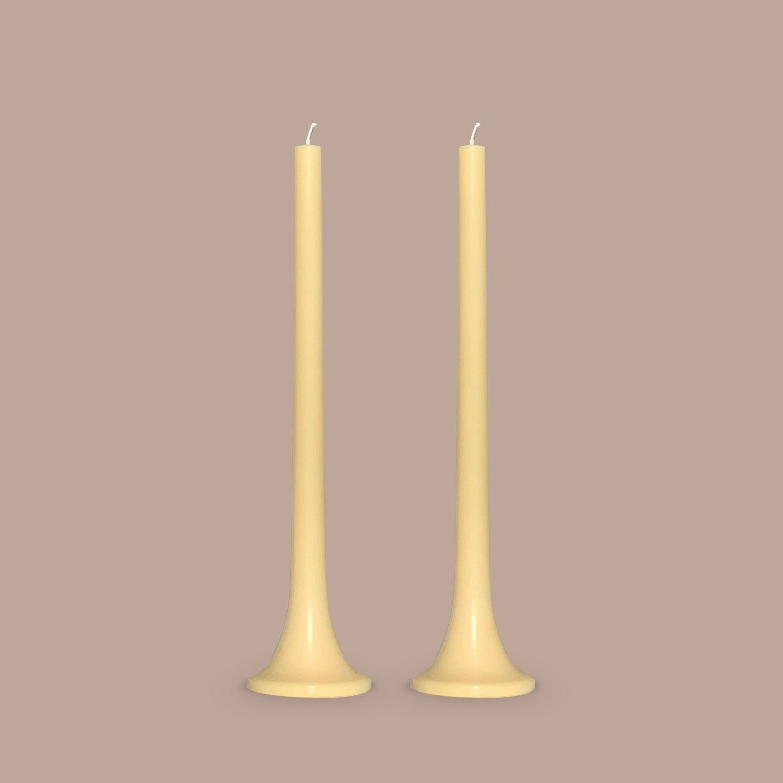 Designer dinner candles in pale yellow