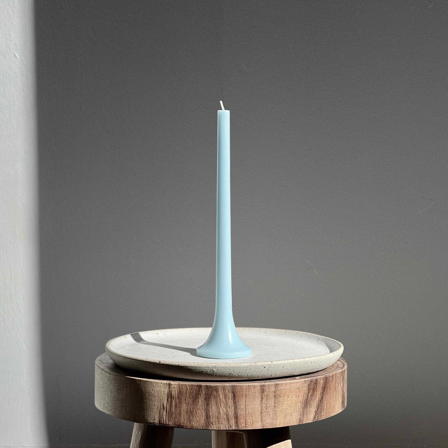 Pastel blue taper candle