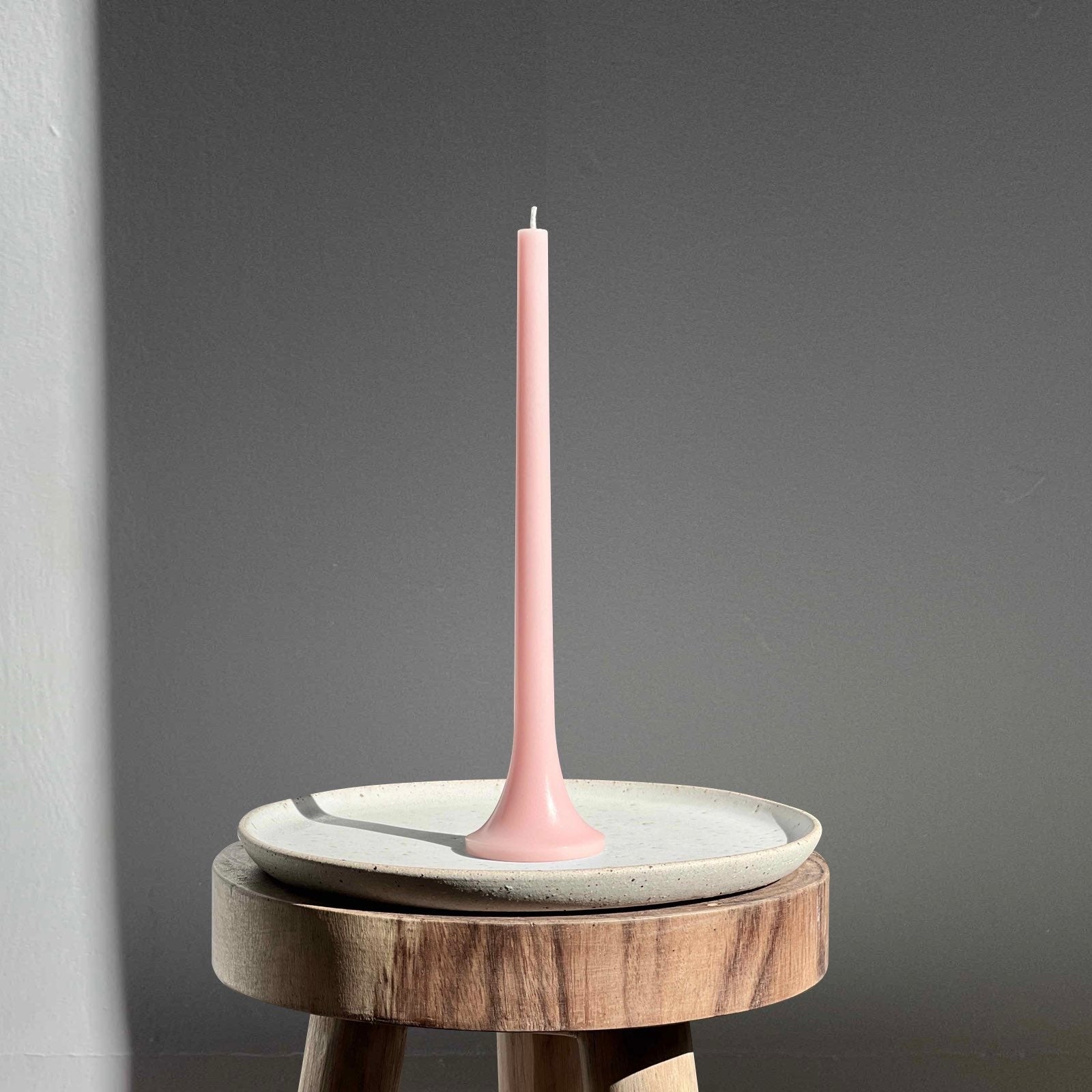 Pastel pink dinner candle