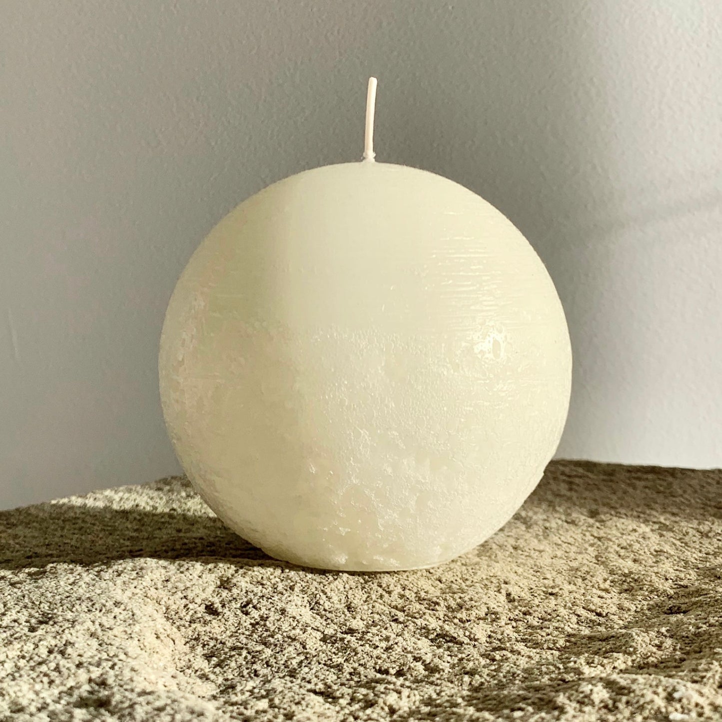 Rustic white round candle