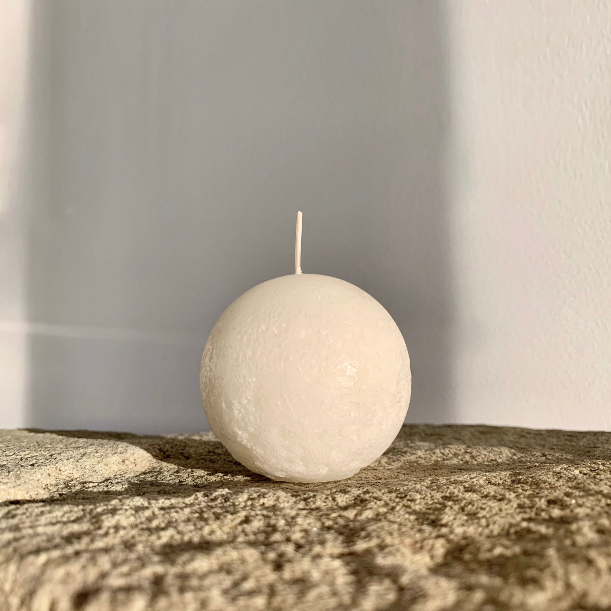 Textured white ball candle