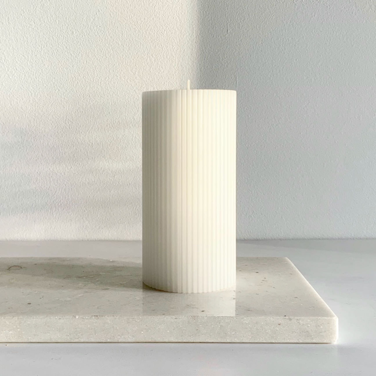 Ribbed white pillar candle