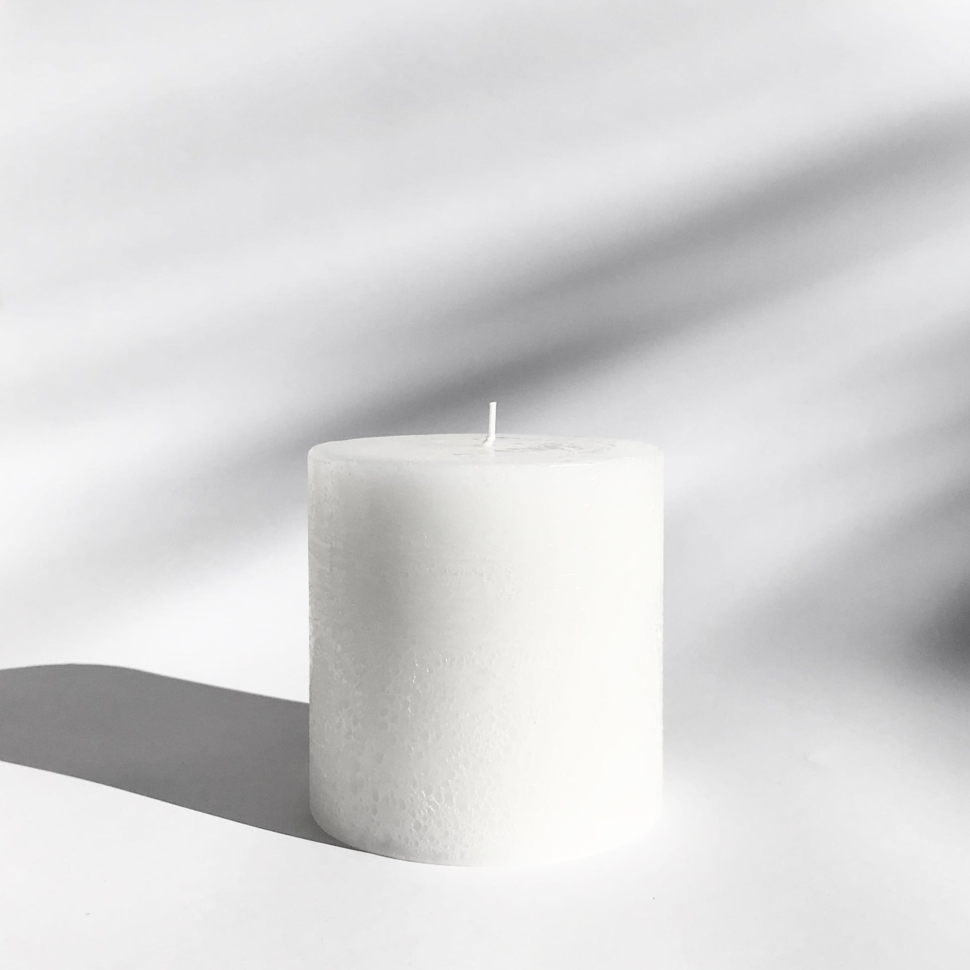 Textured pillar candle in white