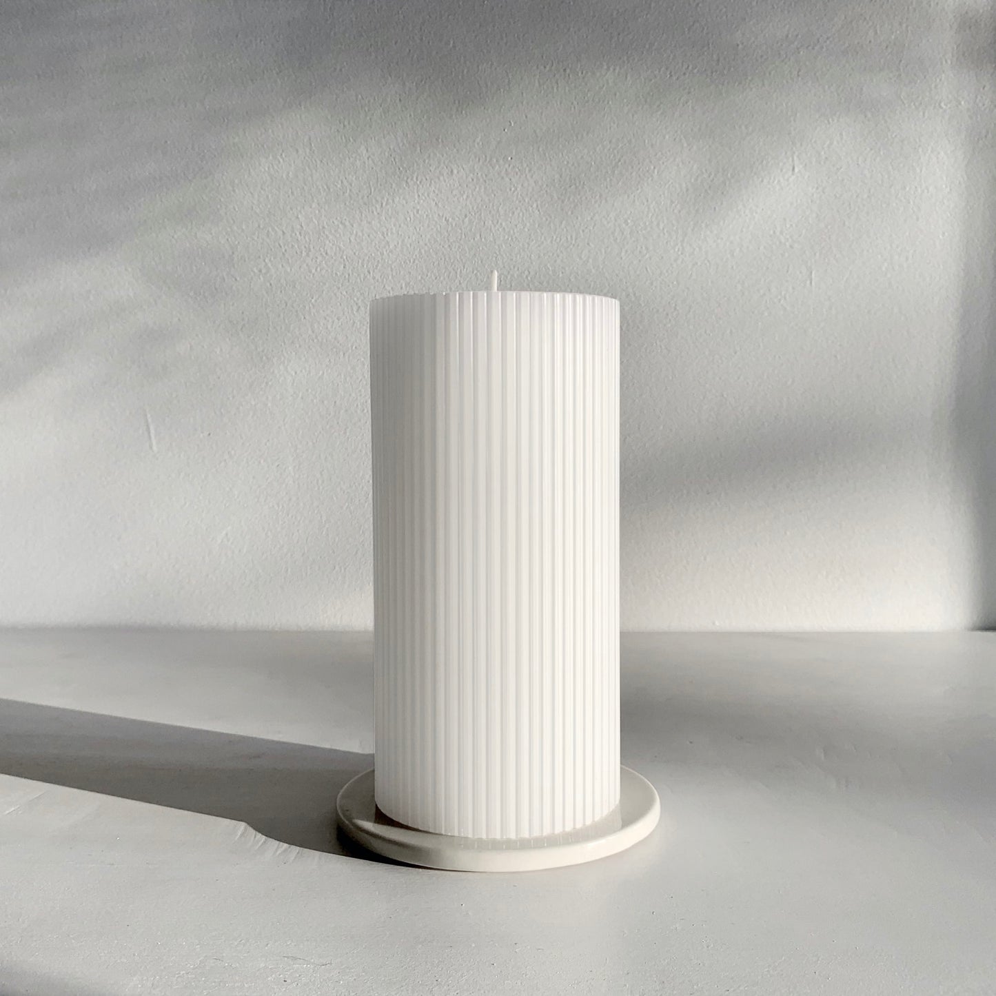 White grooved pillar candle